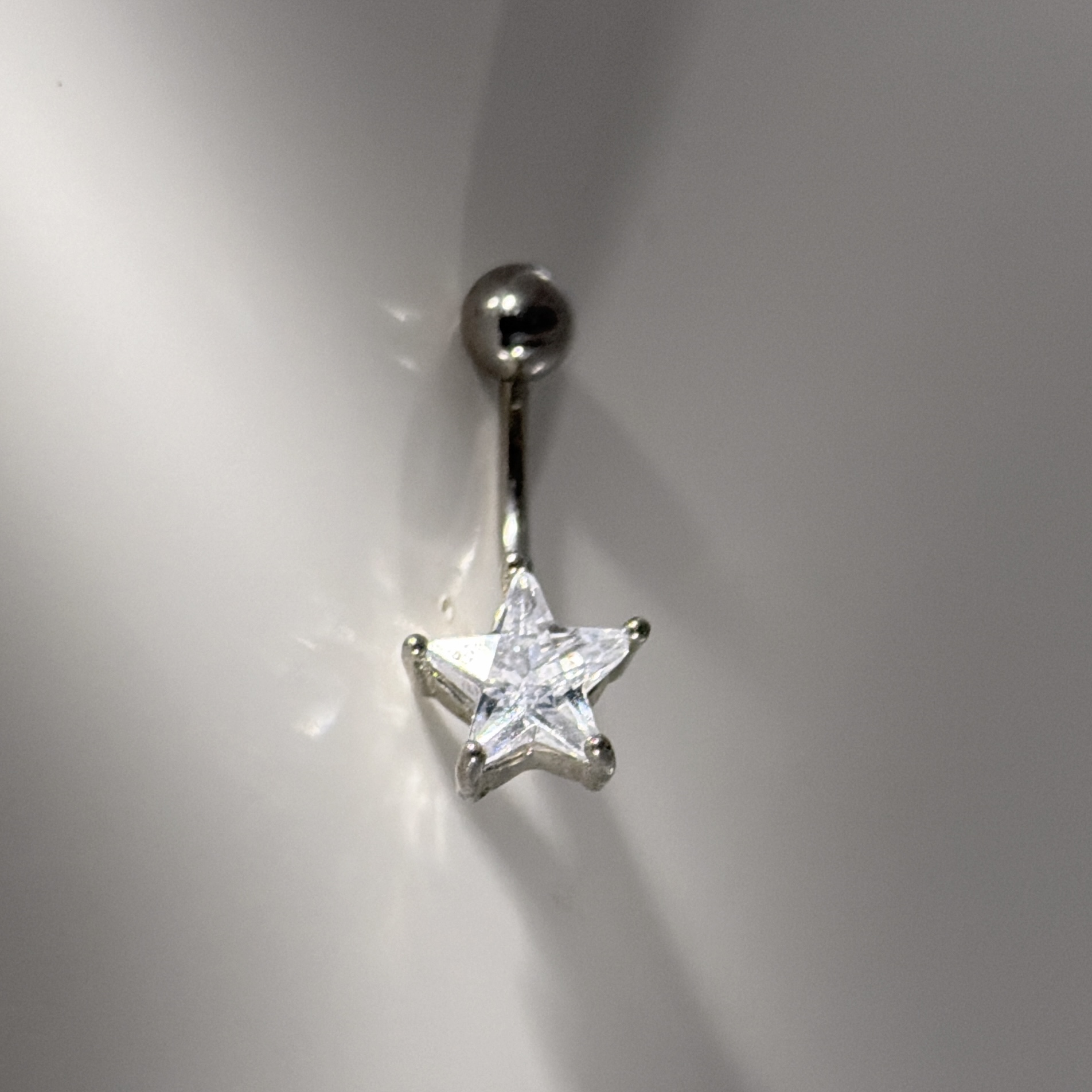 Star belly piercing
